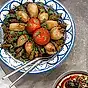 Fyllda ugnsbakade grönsaker och vinblad