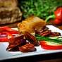 Getostfylld paprika med kryddkorv och grillad “tuppkam”