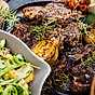Grillade vildsvinskotletter, färskpotatissallad och kryddsmör