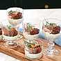 Matjessilltårta i portionsglas med smörstekt kavring