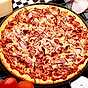 Pizza med rödlök och bacon