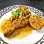 Poulet Yassa - Senegalesisk kyckling med lök och oliver