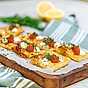 Smördegspizza med Västerbottensost, rom och citron