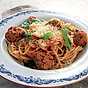 Spaghetti med italienska köttbullar i tomatsås