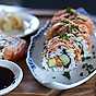 Spicy inside out sushi salmon rolls