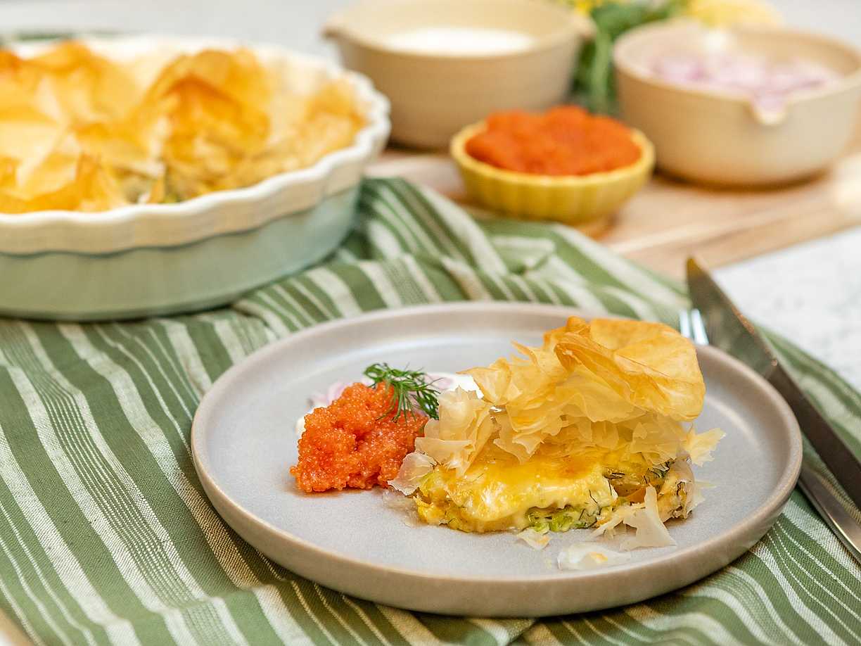 Potatispaj med Västerbottensost, picklad lök och rom