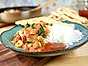 Het currysås med kikärtor och räkor