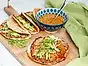Smash dumpling tacos