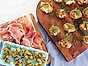 Tapastallrik med minibakade potatisar och pintxos