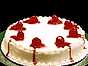 Tårta med vit glasyr och jordgubbar