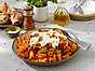 Zeta Pastamore med het tomatsås och stracciatella